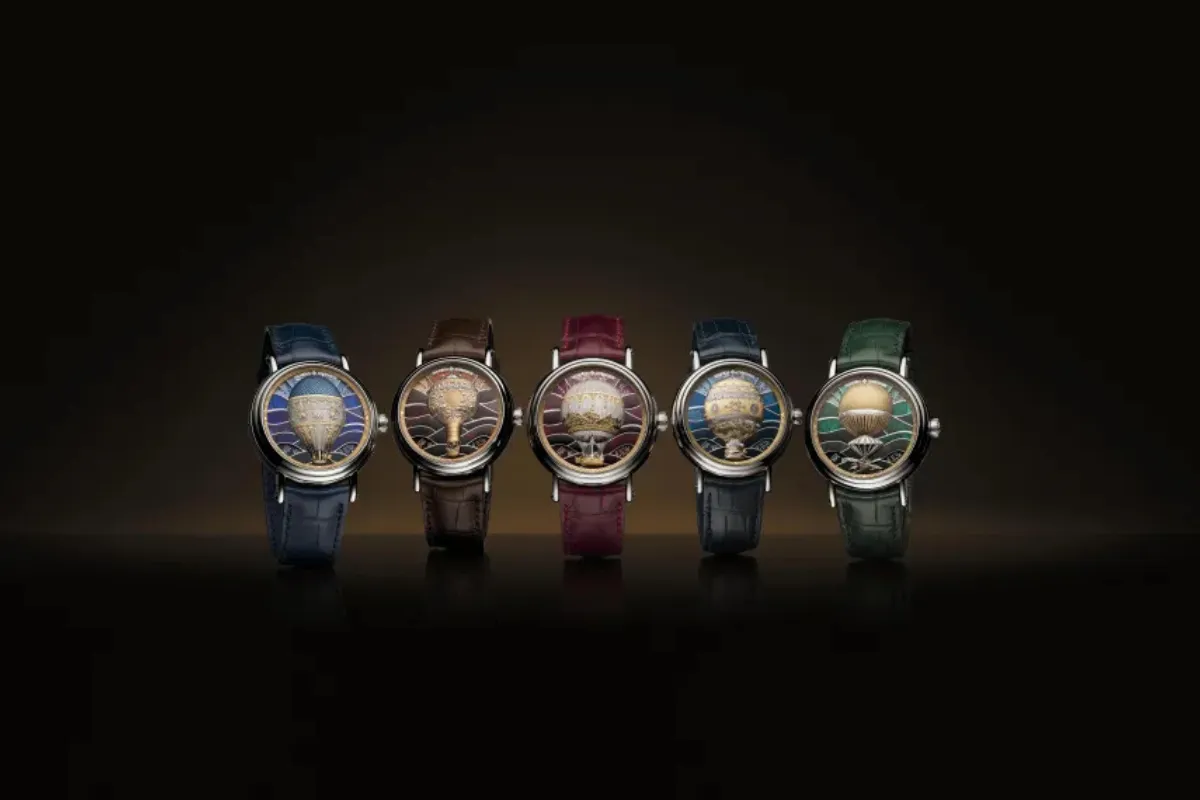 Beş farklı renk deri kayışa sahip, kadranında sıcak hava balonu illüstrasyonu bulunan lüks Vacheron Constantin kol saatleri, siyah fon önünde yan yana sergileniyor.