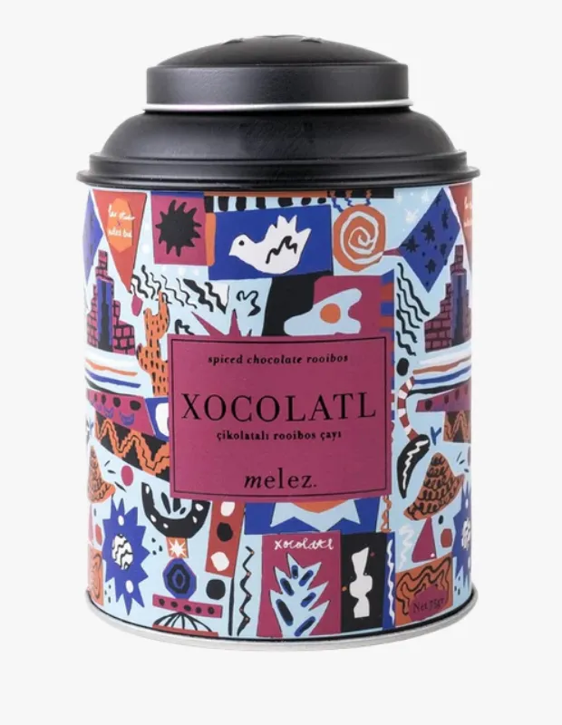 Renkli etnik desenli kutuda çikolatalı rooibos çayı; Melez Tea XOCOLATL özel karışımı.