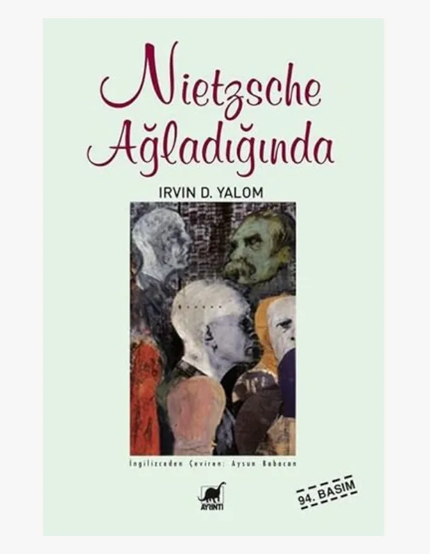 Açık mint yeşili zemin üzerinde, Irvin D. Yalom'un kaleme aldığı ve Aysun Babacan'ın çevirisiyle sunulan Nietzsche Ağladığında adlı kitabın 94. baskı kapağı; bordo kaligrafik başlığın altında, bıyıklı ve düşünceli bir figürün de yer aldığı, soyut ve koyu renkli figürlerin olduğu sanatsal bir illüstrasyonu barındırıyor.