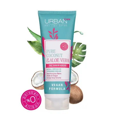 Açık turkuaz renkli URBAN Care Pure Coconut & Aloe Vera Saç Bakım Kremi tüpü, vegan saç bakım ürünleri arasında PETA onaylı formülüyle öne çıkarak boyalı, röfleli ve yıpranmış saçlar için renk koruma, parlaklık ve UV filtresiyle güneşe karşı koruma gibi faydalar sunar.