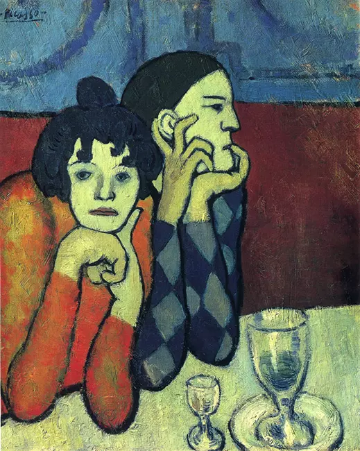 Pablo Picasso'nun Mavi Dönem'e ait “Arlequin ve Sevgilisi” tablosu; hüzünlü yüz ifadeleriyle masada oturan iki figür, soluk mavi tonlar ve duygusal yalnızlık teması.