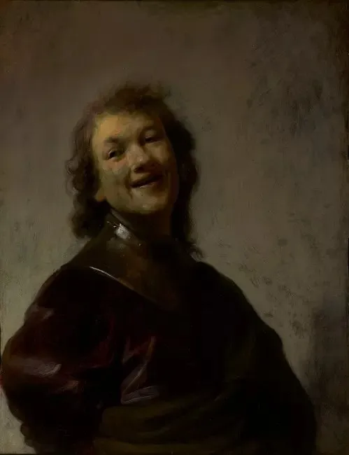 Rembrandt'ın dramatik ışıklandırmanın etkisiyle belirginleşen, yüzünde neşeli ve geniş bir gülümsemeyle neredeyse kahkaha atar gibi görünen, kıvırcık saçlı genç bir adamı koyu renkli giysi veya zırh içinde resmeden barok tarzı bir portre.