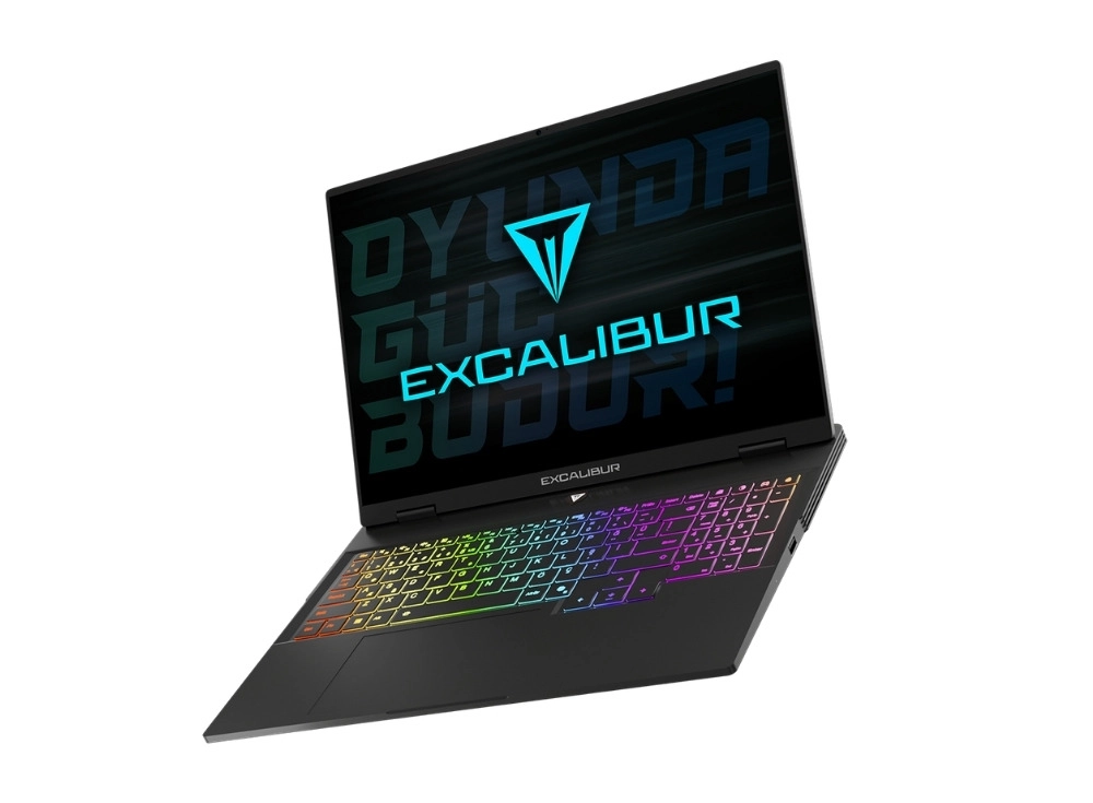 Beyaz bir arka plan üzerinde hafif açılı konumlanmış siyah Casper Excalibur dizüstü oyun bilgisayarı; ekranında Excalibur logosu ve OYUNDA GÜÇ BUDUR! sloganı belirgin bir şekilde parlarken, klavyesi çok renkli RGB aydınlatmasıyla dikkat çekiyor.