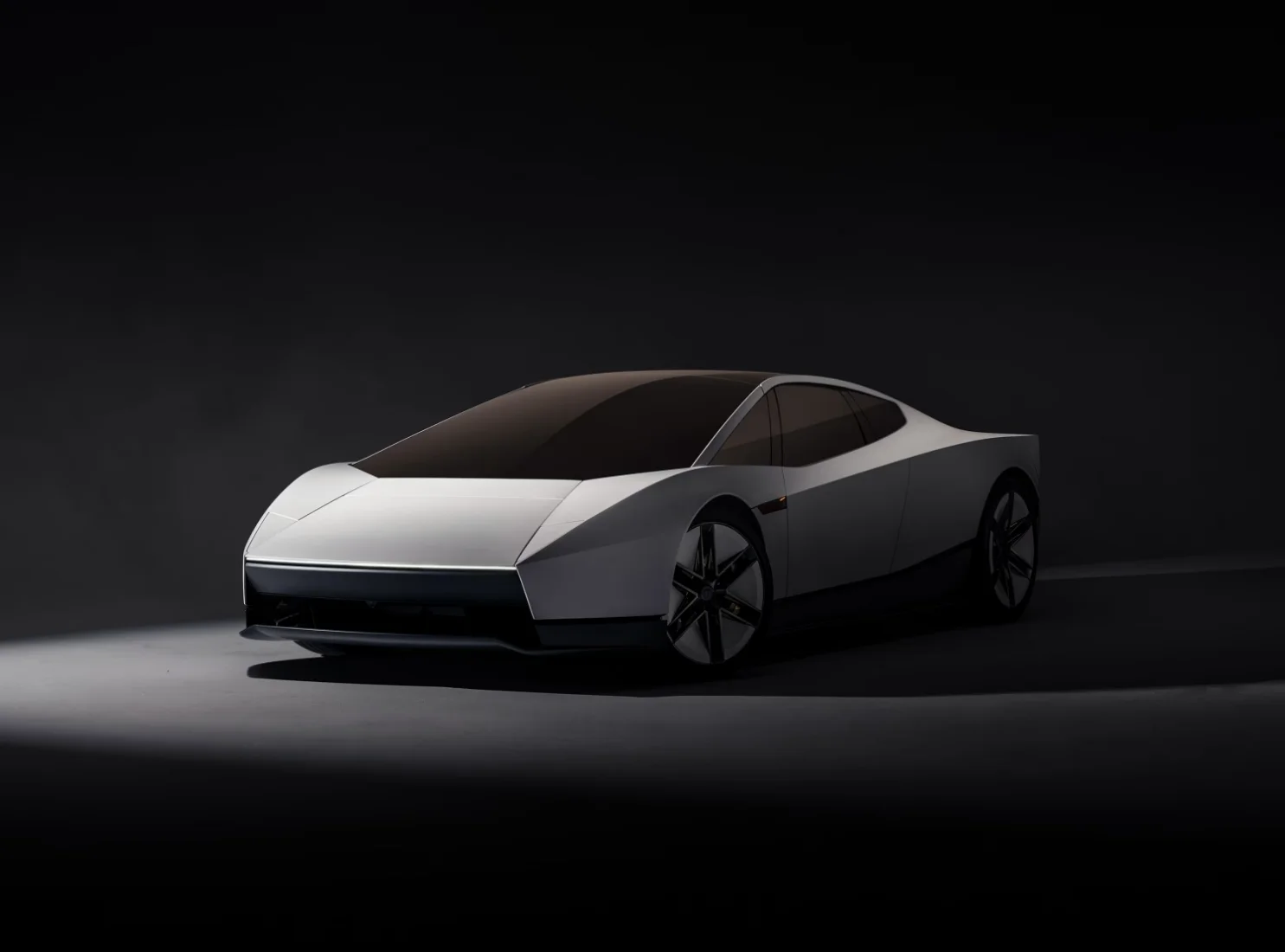 Karanlık bir arka planda hızla ilerleyen, arka kısmındaki güçlü roket iticilerinden alevler fışkıran gümüş renkli bir Tesla Roadster otomobili, geleceğin uçan araba teknolojilerine dair ipuçları sunuyor.