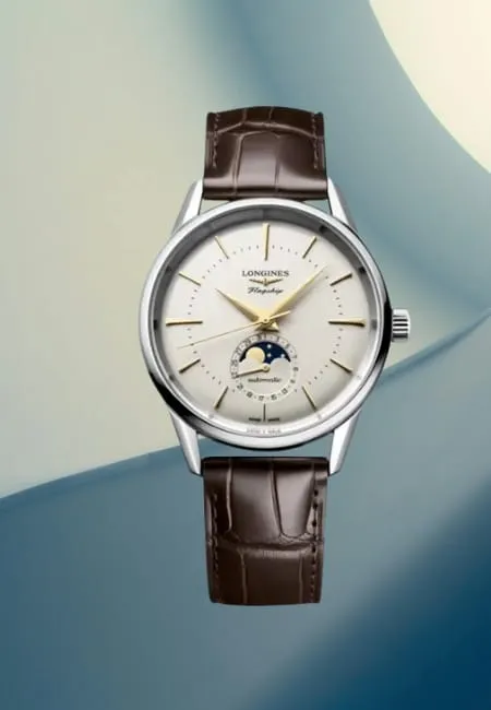 Longines Master Collection modeli, kahverengi deri kayışlı, gümüş kadranlı ve ay fazı göstergeli klasik İsviçre lüks saati
