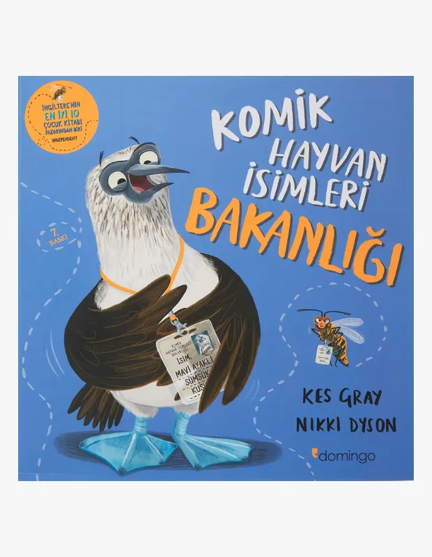 Parlak mavi bir çocuk kitabı kapağında, Komik Hayvan İsimleri Bakanlığı başlıklı, büyük gözlü, Mavi Ayaklı Sümsük Kuşu yazılı bir kimlik kartı takan kocaman mavi ayaklı bir sümsük kuşu figürü, ilgi çekici görseller ve eğlenceli hikayelerle dolu çocuk kitaplarının okuma sevgisini nasıl ateşleyip çocukların hayal dünyasını zenginleştirebileceğini vurguluyor.