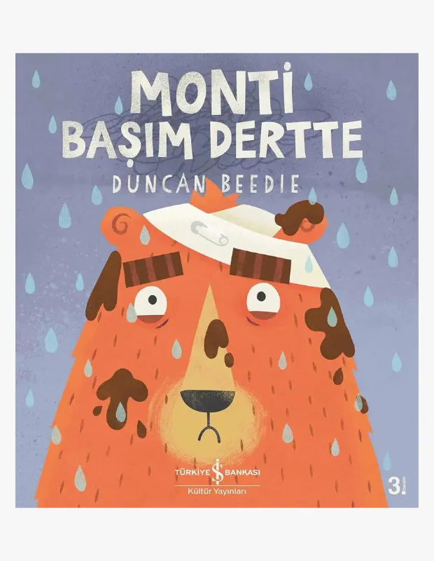 Duncan Beedie'nin Monti Başım Dertte adlı çocuk kitabının dikkat çekici kapağında, yağmur damlaları altında, alnında yara bandı ve çamur lekeleriyle üzgün görünen sevimli turuncu bir ayı karakteri, çocukların hayal dünyasını zenginleştirerek okuma alışkanlığını destekleyen kitapların önemini yansıtıyor.