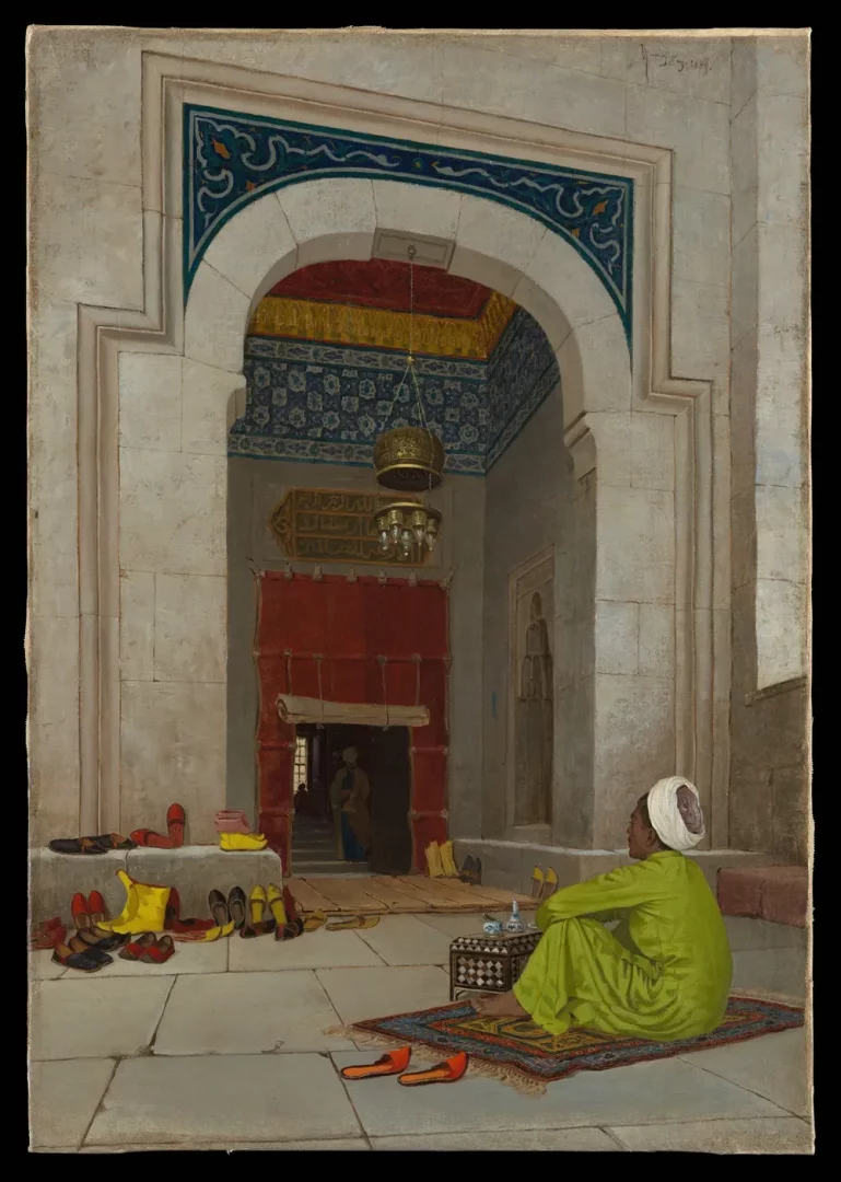 Osman Hamdi Bey'in bu tablosunda, kemerli ve çinili bir iç mekanda, yeşil cübbeli ve beyaz sarıklı bir adam işlemeli bir seccade üzerinde bağdaş kurmuş otururken, etrafta rengarenk terlikler ve asılı lambalar dikkat çekiyor.