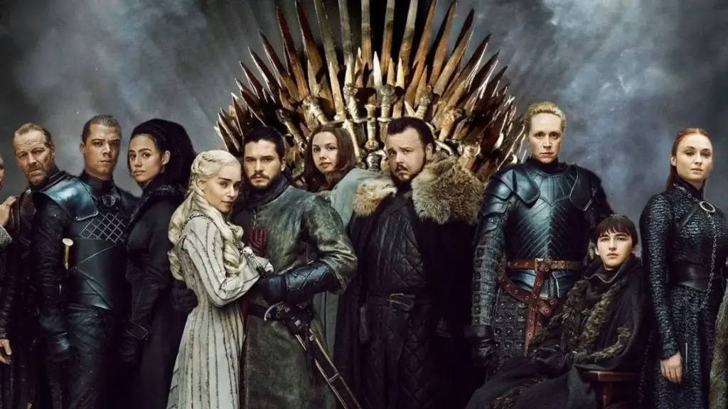 Game of Thrones dizisinin ana karakterleri Demir Taht'ın önünde karanlık bir atmosferde duruyor.
