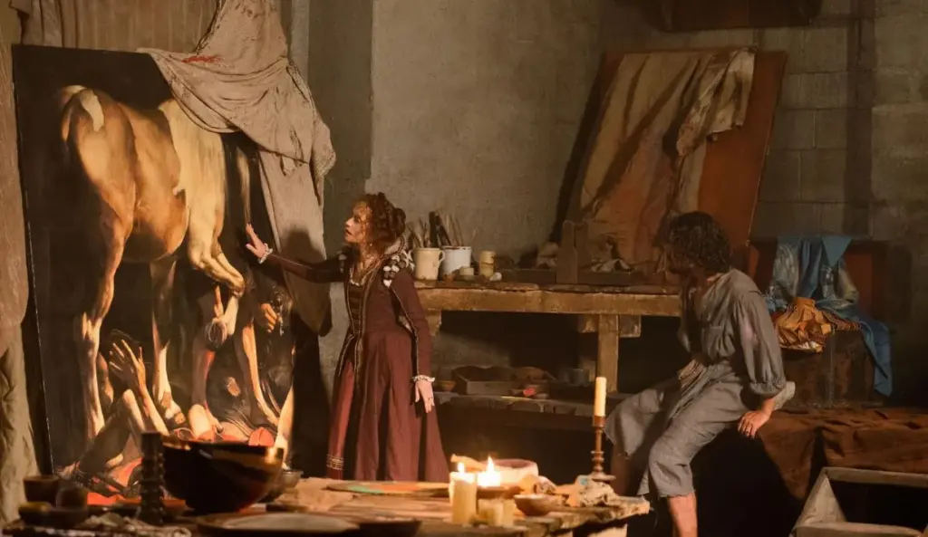 Caravaggio’s Shadow filminden bir sahne; ressamın atölyesinde dev boyutta bir tablo önünde geçen kurgu anı.