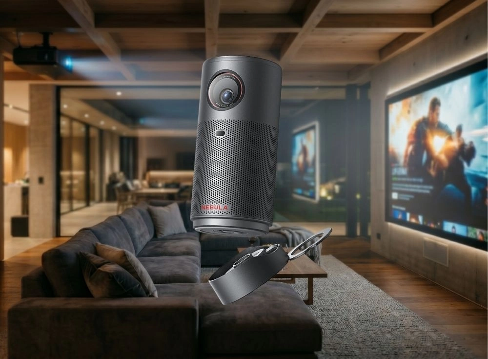 Modern bir oturma odasında, film gösteren dev bir ekranın önünde havada duran Anker Nebula Capsule taşınabilir akıllı projeksiyon cihazı, ızgaralı tasarımı ve kompakt boyutuyla ev eğlencesi için pratik bir çözüm sunuyor.