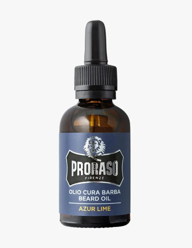 Beyaz arka plan üzerinde duran, gümüş Proraso logosu ve Azur Lime aromasıyla öne çıkan koyu mavi etikete sahip, siyah damlalıklı kapağı olan kahverengi cam bir Proraso sakal yağı şişesi, etiketinde Olio Cura Barba ve Beard Oil yazılarıyla ürünün sakal bakımı için olduğunu belirtiyor.