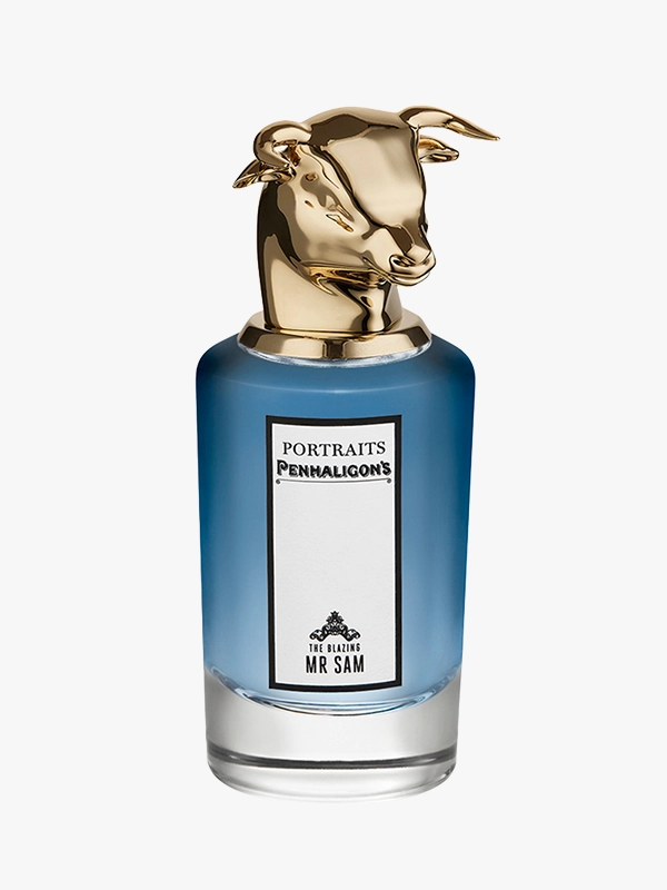 Penhaligon’s The Blazing Mr Sam parfümü, mavi cam şişesi ve altın boğa başlı kapağıyla portre koleksiyonu görseli.