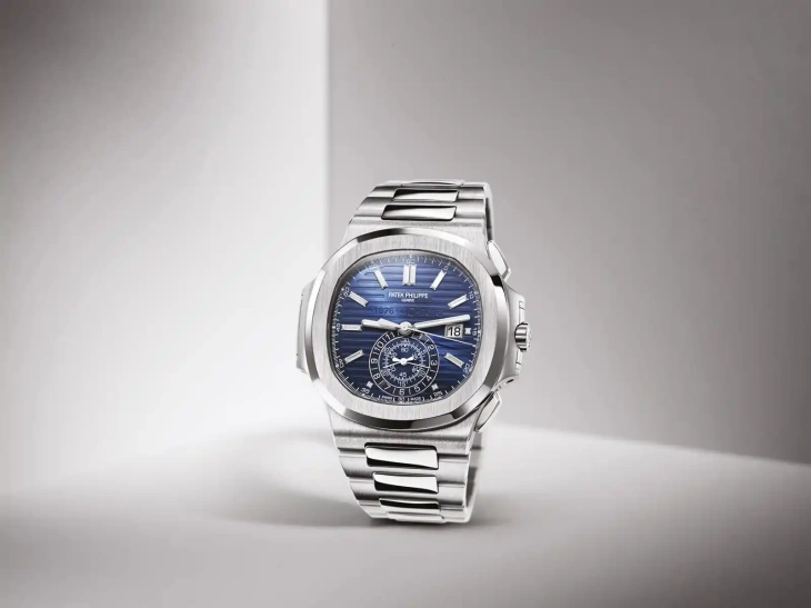 Patek Philippe Nautilus 5976/1G beyaz altın, kronograflı, 40. yıl özel limitli üretim erkek kol saati