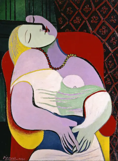 Picasso'nun 1932 tarihli, ilham perisi Marie-Thérèse Walter'ı bir koltukta uyuklarken veya düşlerken, yüz hatları kübist tarzda çarpıtılmış, canlı sarı, mor ve kırmızı tonlarıyla dolu ikonik bir portresi.