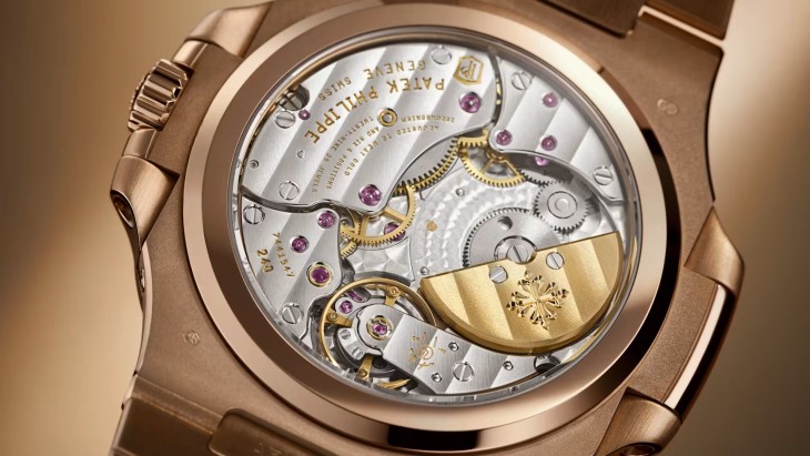 Patek Philippe Nautilus Ref. 5712 perpetual yıllık takvim, sarı altın, lüks saat mekanizması