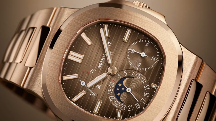 Patek Philippe Nautilus Ref. 5712 perpetual yıllık takvim, sarı altın, lüks saat