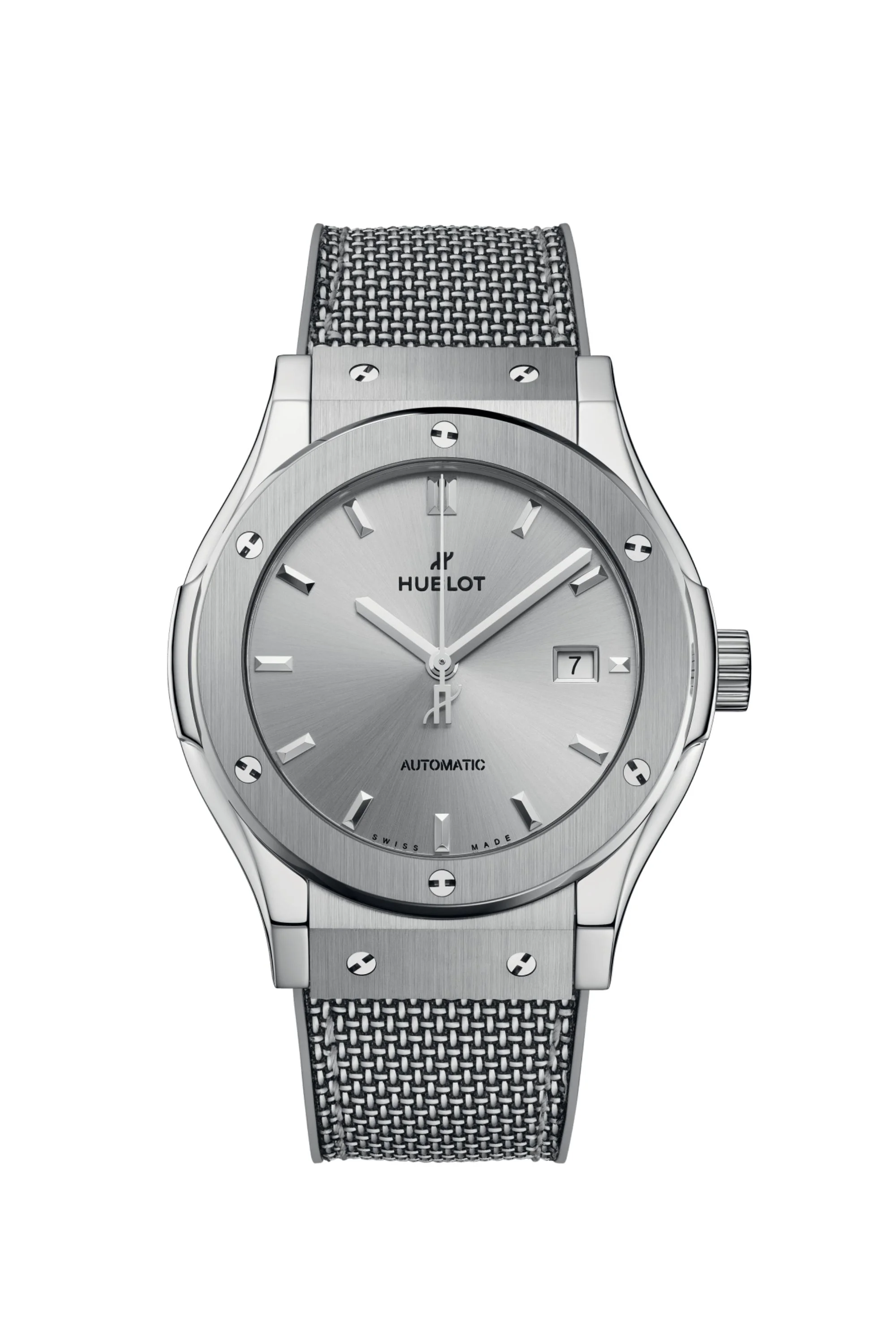 Oscar 2026 töreninde Joe Alwyn'in tercih edeceği belirtilen Hublot Classic Fusion Essential Grey saati, fırçalanmış gri metalik kasası, gri kadranındaki tarih penceresi ve çubuk indeksleri, aynı tonlarda metal örgülü kordonuyla dikkat çekiyor.