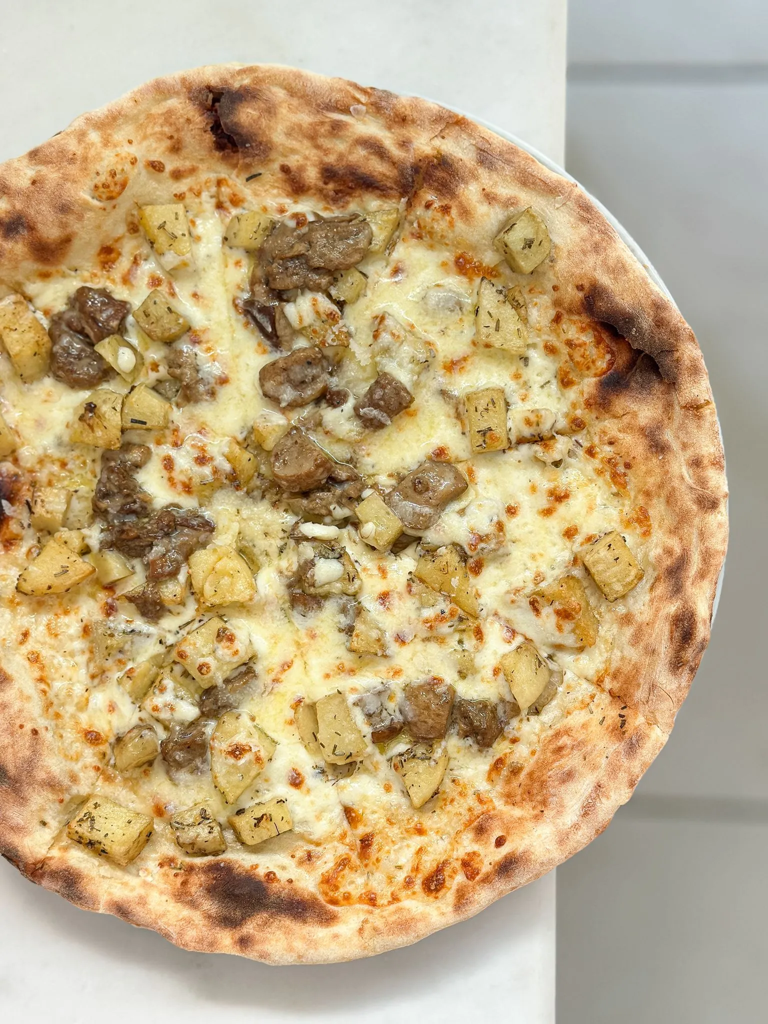 Il Pellicano kabaklı pizzası.