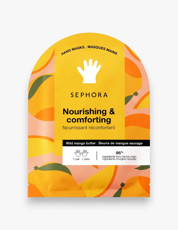 Parlak sarı ve şeftali tonlarında, mango desenleriyle süslenmiş, üst kısmı yuvarlak Sephora Collection El Maskesi ambalajı, üzerinde büyük beyaz bir el simgesi, Besleyici ve Rahatlatıcı yazıları ile vahşi mango yağı içeriğini açıkça gösteriyor.