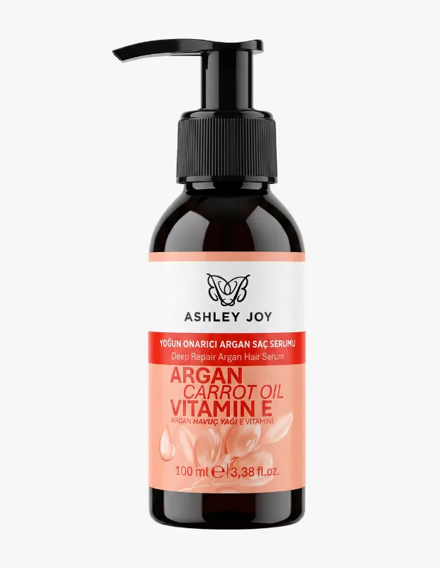 Ashley Joy markalı, siyah pompa başlıklı koyu renkli şişesinde, ARGAN, HAVUÇ YAĞI ve E VİTAMİNİ içeren 100 ml’lik yoğun onarıcı saç serumu, ürünün ana özelliklerini belirgin şekilde sunuyor.