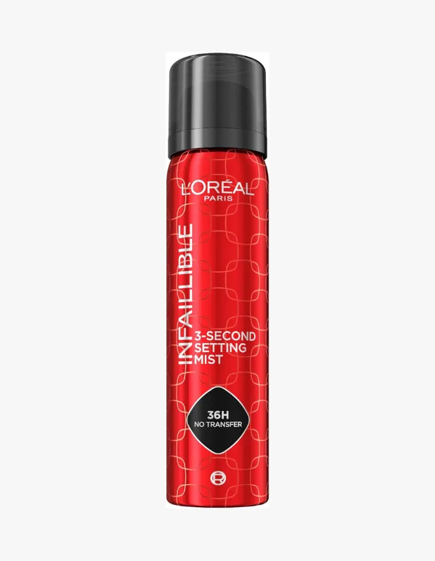 Dik bir şekilde konumlandırılmış, siyah kapaklı parlak kırmızı L'Oréal Paris Infaillible 3-Second makyaj sabitleme spreyi, üzerinde '3-Second Setting Mist' ve '36H No Transfer' ibareleri bulunan şık tasarımıyla önden tam olarak görülmektedir.