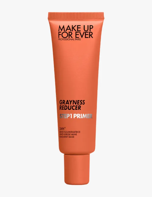 Make Up For Ever Step 1 Primer serisinden, ciltteki gri görünümü azaltmaya yardımcı olduğu belirtilen, 24 saat etkili ve aydınlatıcı baza sahip, dik duran, turuncu renkli bir tüp makyaj ürünü.