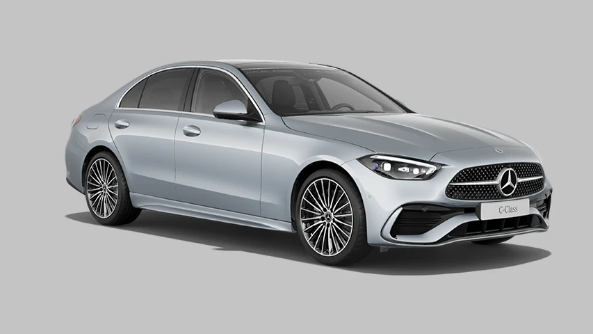 Açık gri bir fon önünde, sol ön çaprazdan çekilmiş, gümüş renkli, parlak çok kollu jantlara ve belirgin Mercedes yıldızlı ızgaraya sahip, yeni nesil Mercedes-Benz C Serisi C200 4MATIC sedan modeli modern ve şık çizgilerini gözler önüne seriyor.