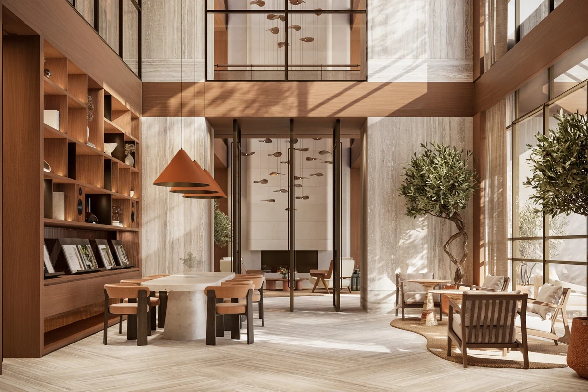 Mesa Casa Well lobisinde kütüphane, ortak masa ve farklı oturma alanları.