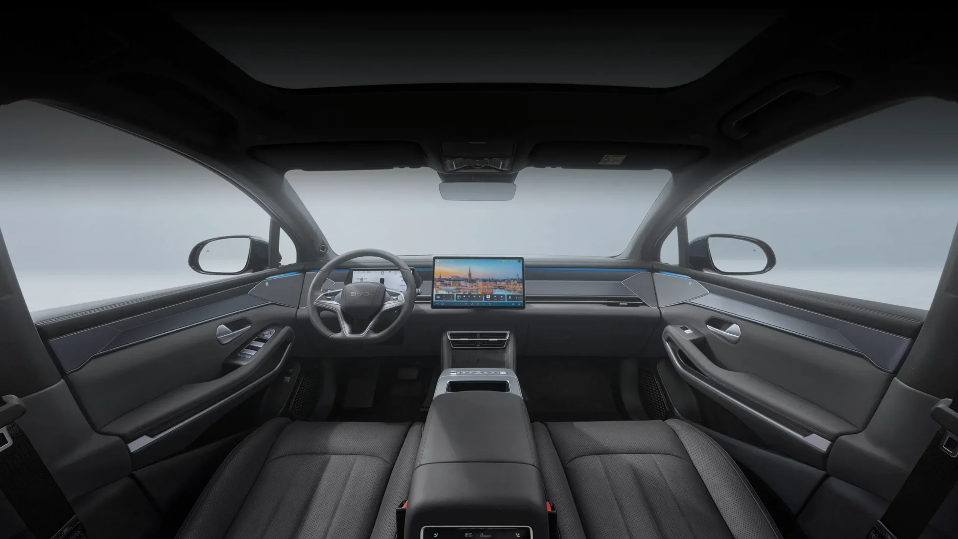 BYD markasına ait, geniş dönebilen dokunmatik ekranı, modern direksiyon simidi ve kaliteli malzemeleriyle öne çıkan bu elektrikli lüks premium SUV otomobilin iç mekanı, ileri teknoloji ve konforlu bir sürüş deneyimi sunuyor.