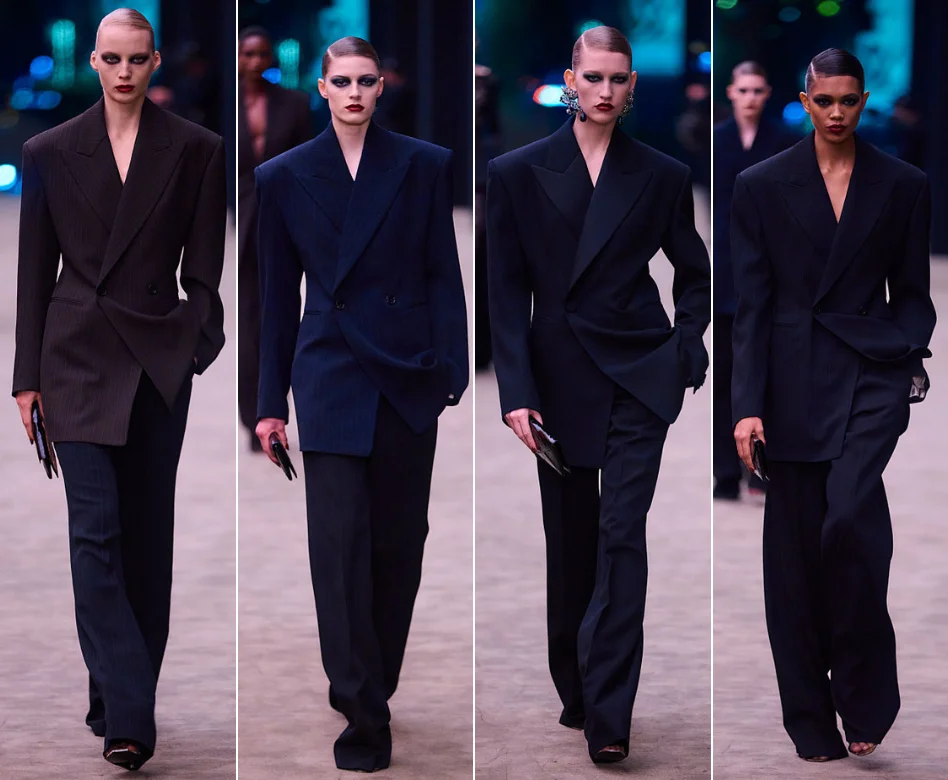 Anthony Vaccarello tarafından modern bir yaklaşımla tasarlanmış, derin V yaka ve tek düğmeli ceketiyle dikkat çeken, zarif siyah bir Le Smoking takım elbise, keskin hatlara sahip pantolonla tamamlanarak güçlü ve sofistike bir stil sunuyor.