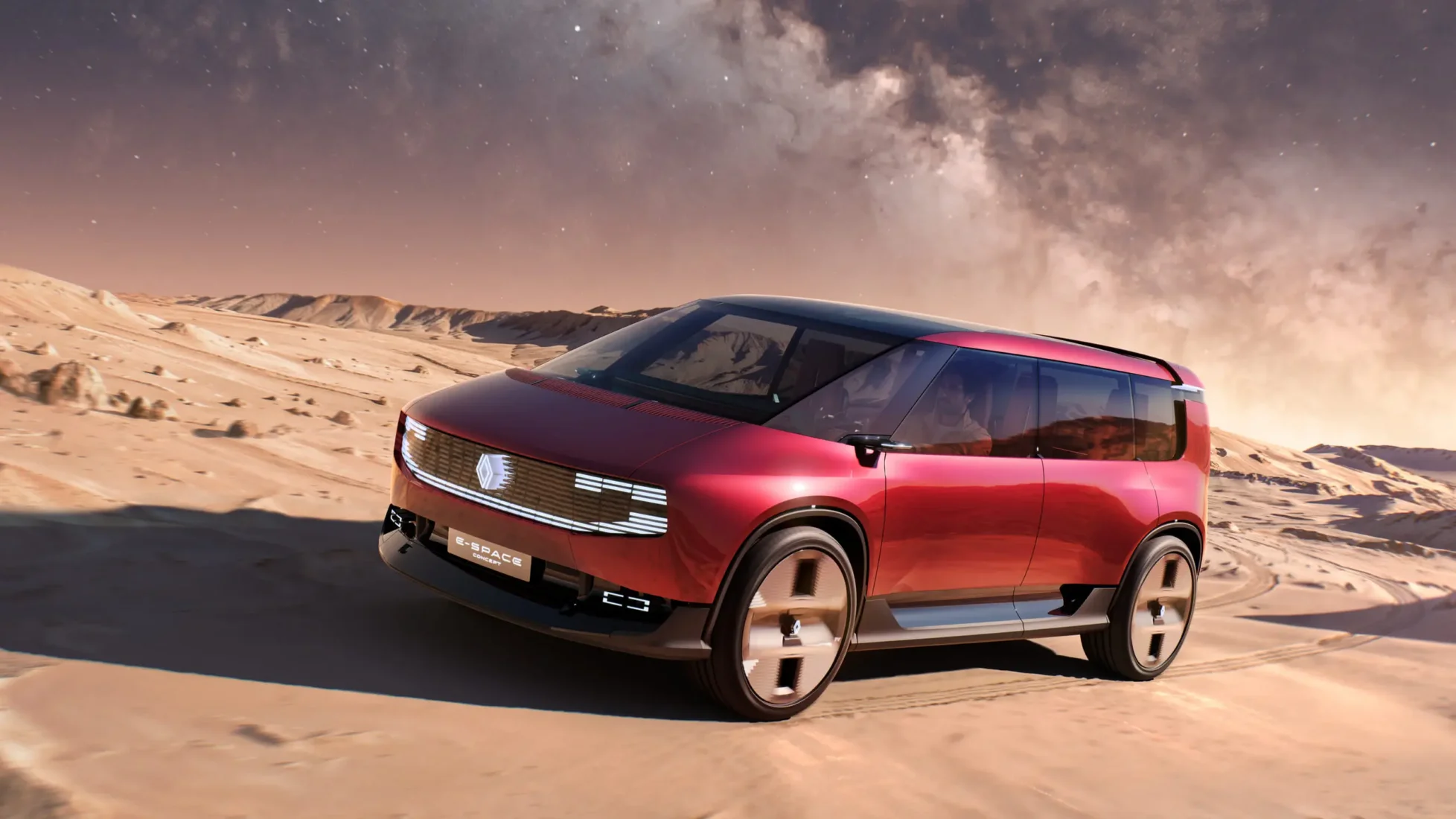 Geleceğin otomobil tasarımını yansıtan, aerodinamik gümüş rengi gövdesi, keskin LED farları ve karakteristik ön ızgarasıyla öne çıkan Renault Espace konsept otomobil, geniş ve modern bir SUV görünümü sergiliyor.